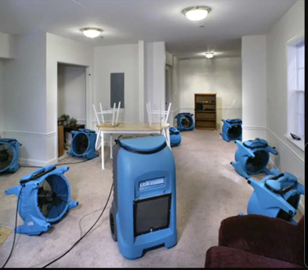 Air movers and dehumidifier setup for Water Damage Restoration in St. Matthews